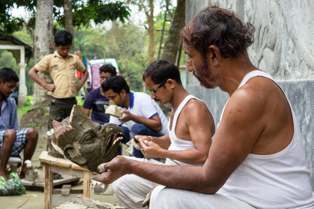 Artisans making masks in Majuli